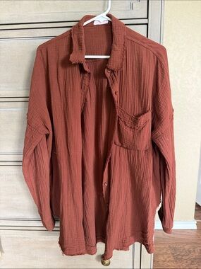 Pink lily gauze-y top. Warm brown
